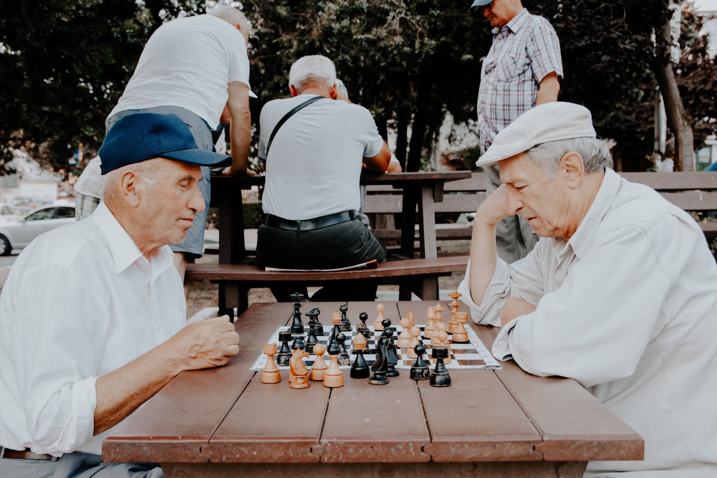 Older Gentlemen playing chess in the Park